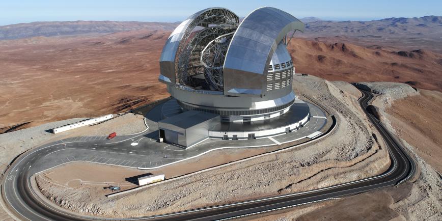 Rendering of what the Extremely Large Telescope will look like at the top of a sandy coloured mountain