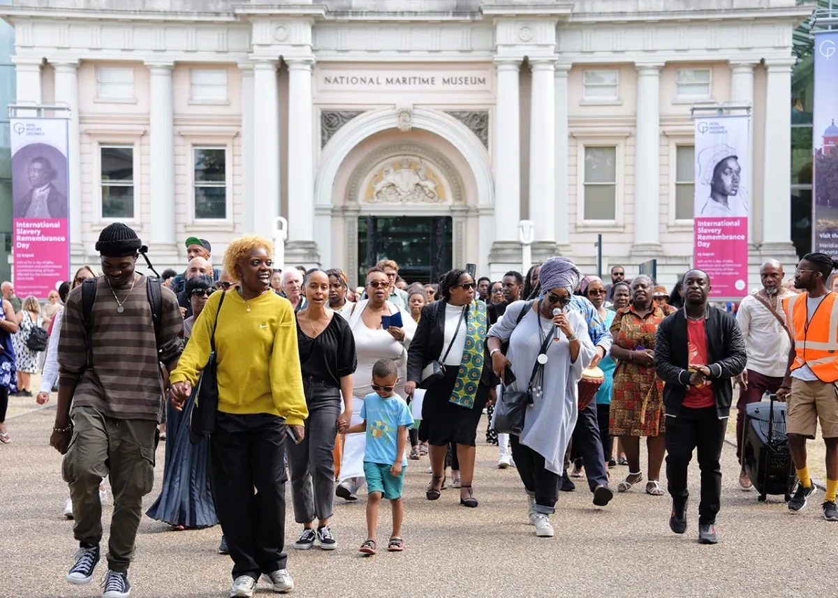 A procession from the National Maritime Museum to the River Thames during Slavery Remembrance Day