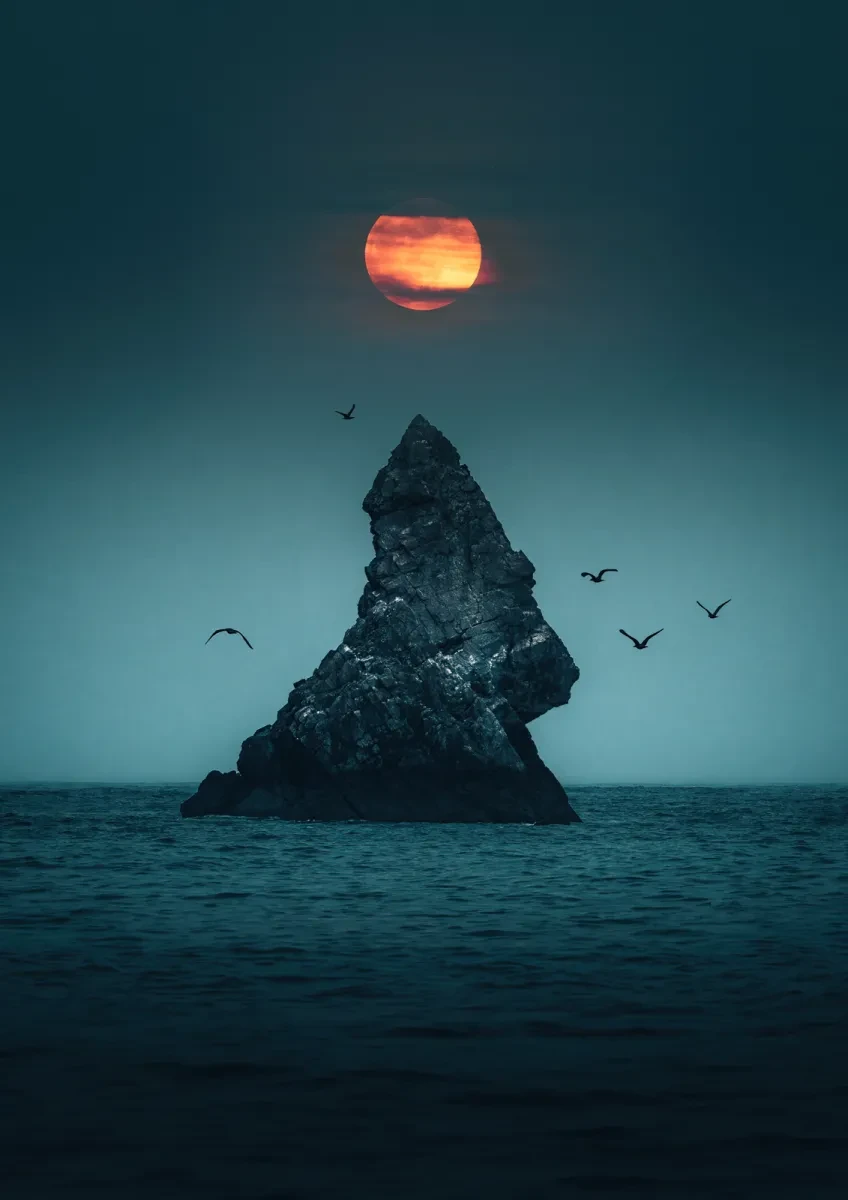 Full Moon rising over the sea and Church Rock in Broadhaven, Pembrokeshire