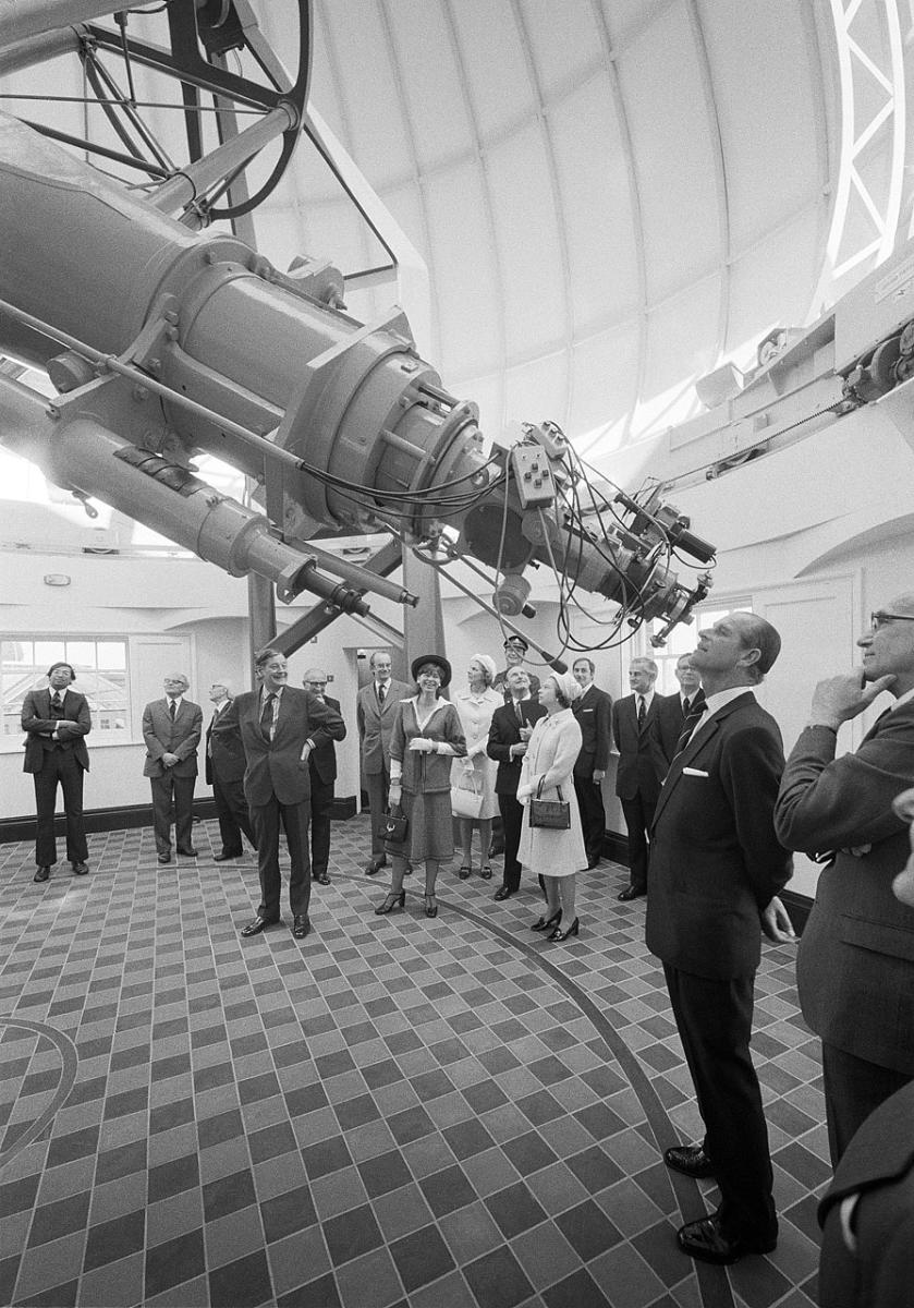 Prince Philip examines the Great Equatorial Telescope at the Royal Observatory in 1975