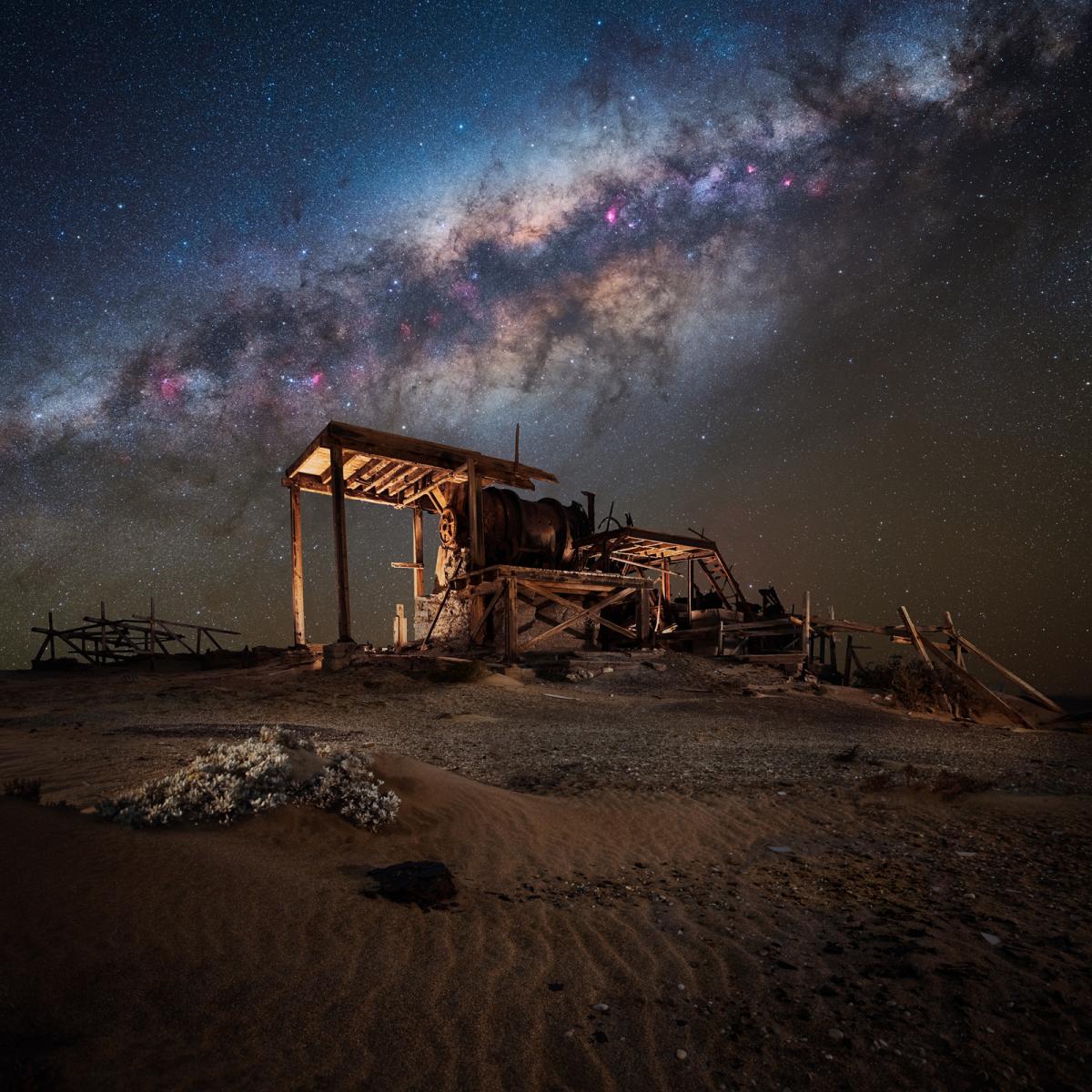 Dilapidated mining processing plant in Namibia with Milky Way above