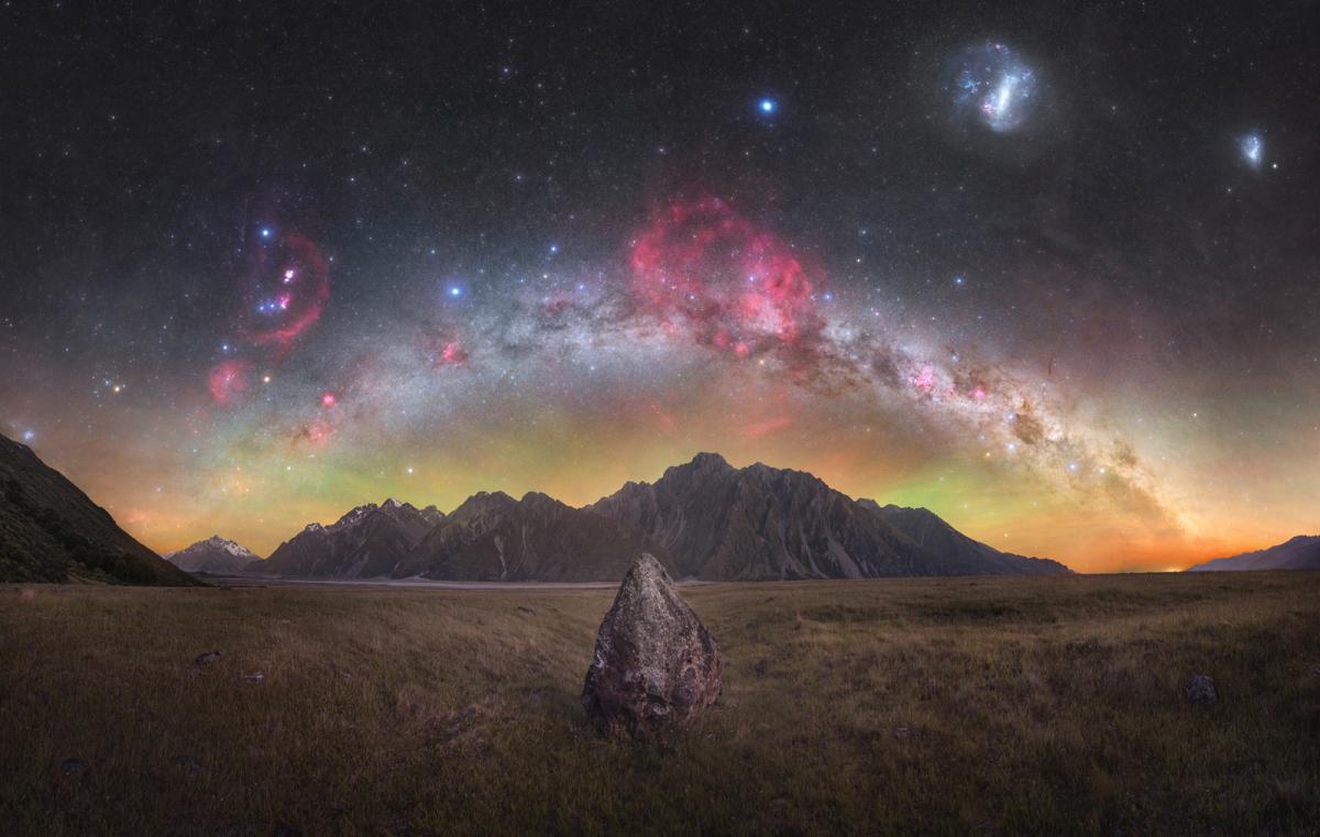 Rugged peaks of the Tasman Valley framed by hydrogen clouds