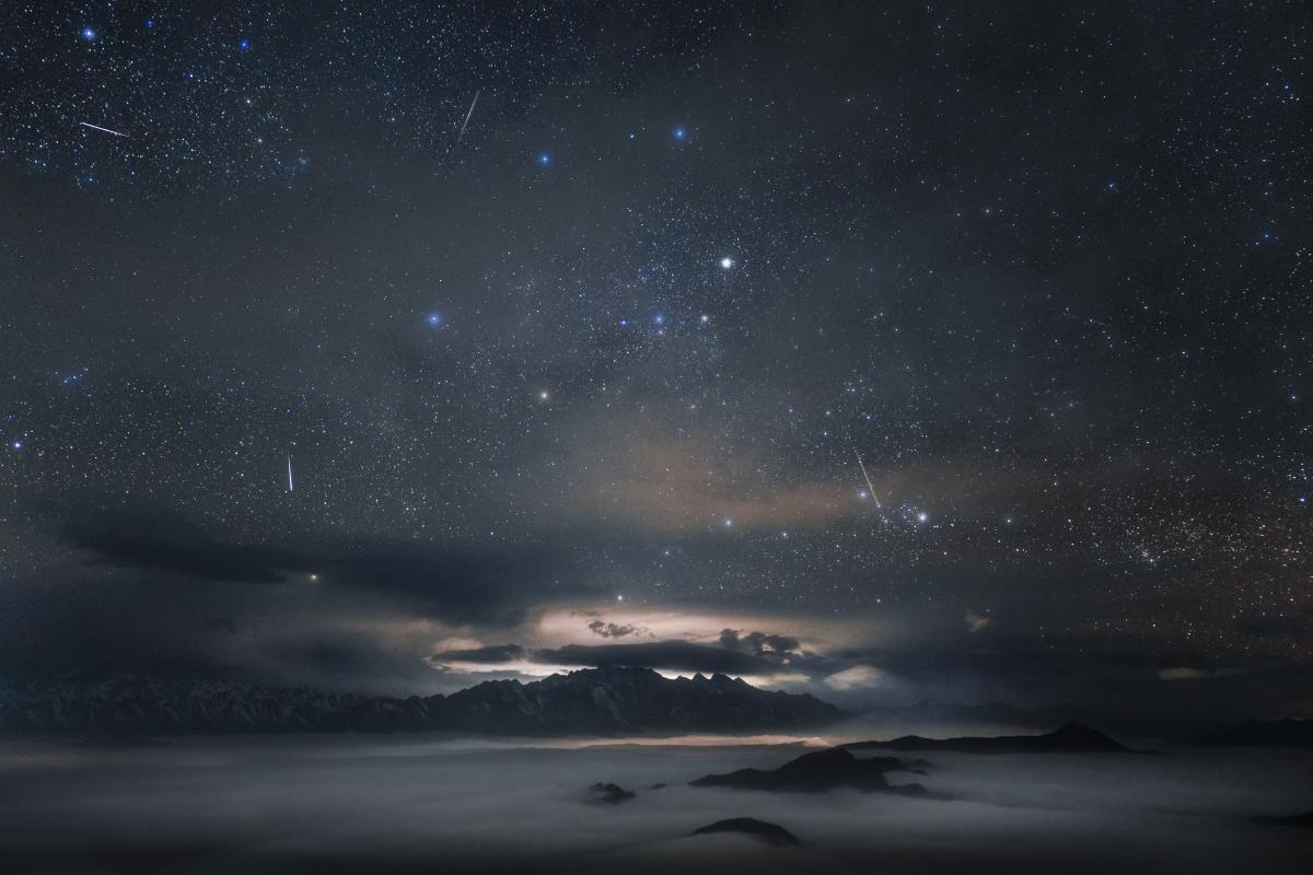 Quadrantid meteor shower over mountains