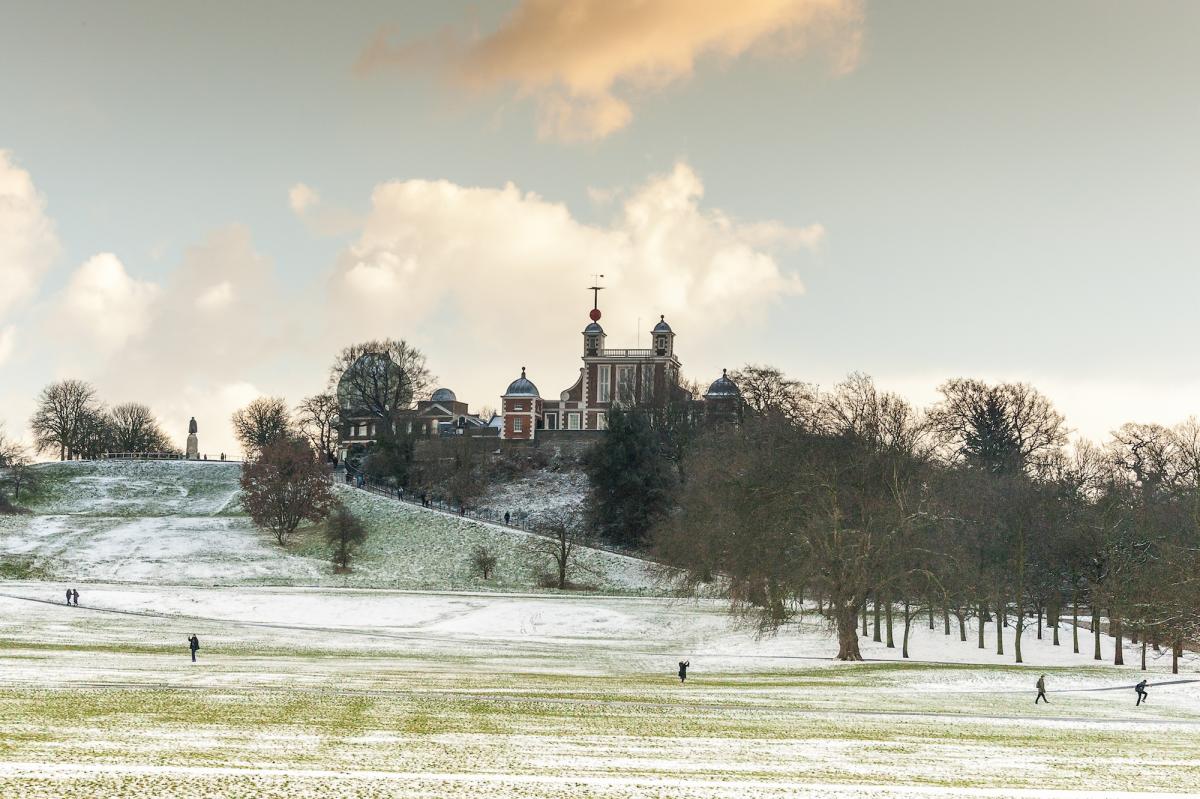 Winter sunlight in Greenwich Park, with the buildings of the Royal Observatory visible on the hill