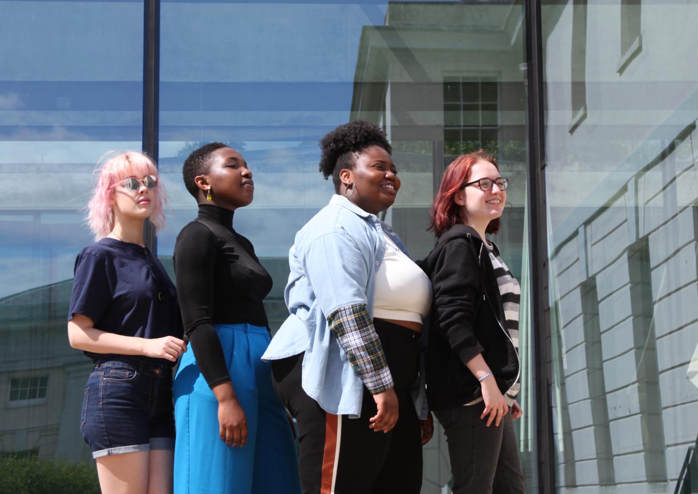 4 young people standing together outside the Museum