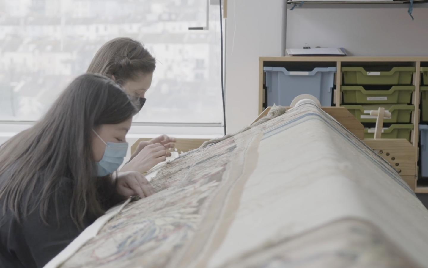 Weavers working on Solebay tapestry