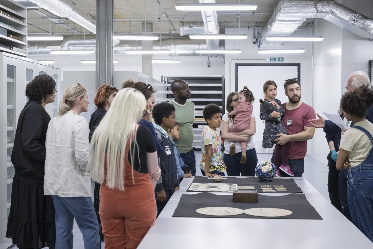 group of people listening to tour guide 