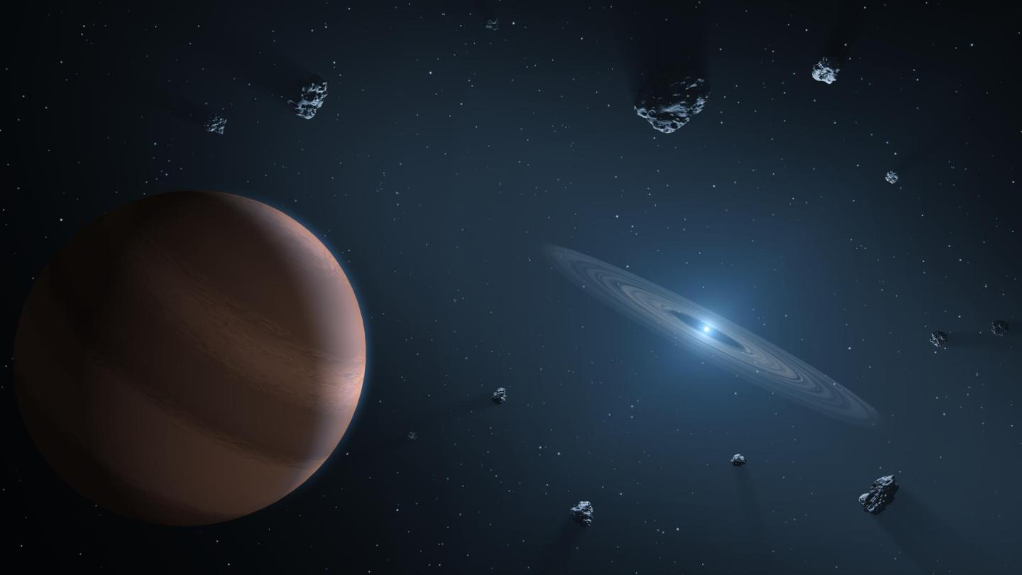 An artist's concept showing an exoplanet and debris disc orbiting a polluted white dwarf.