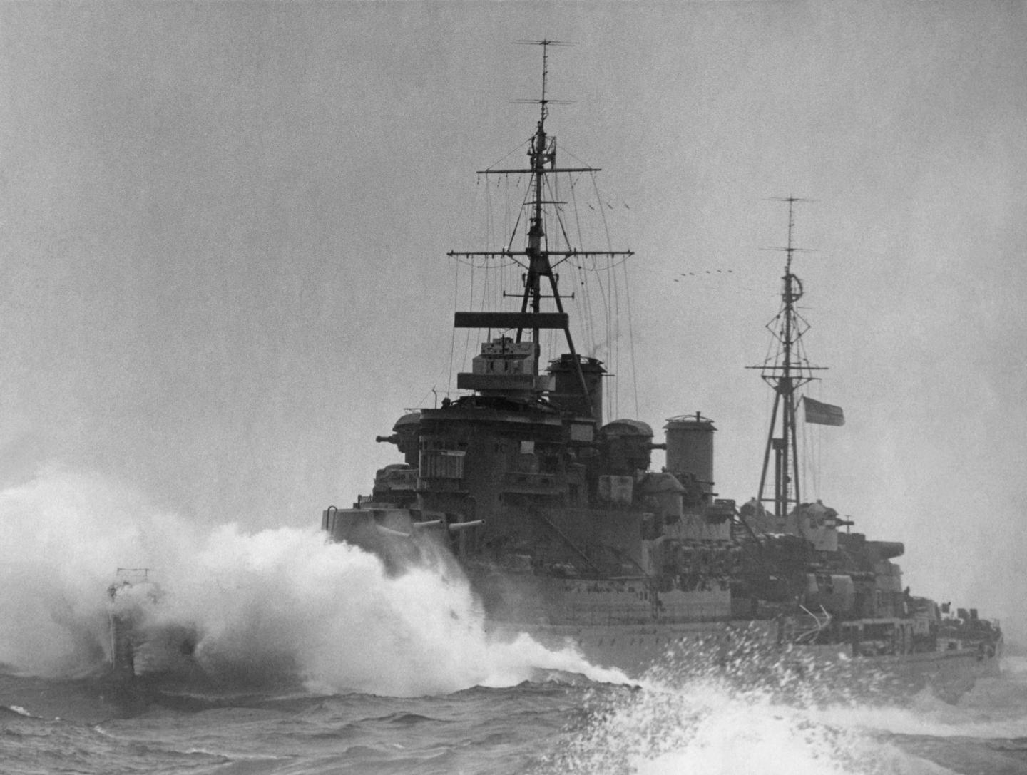 A black and white photo of HMS Kenya