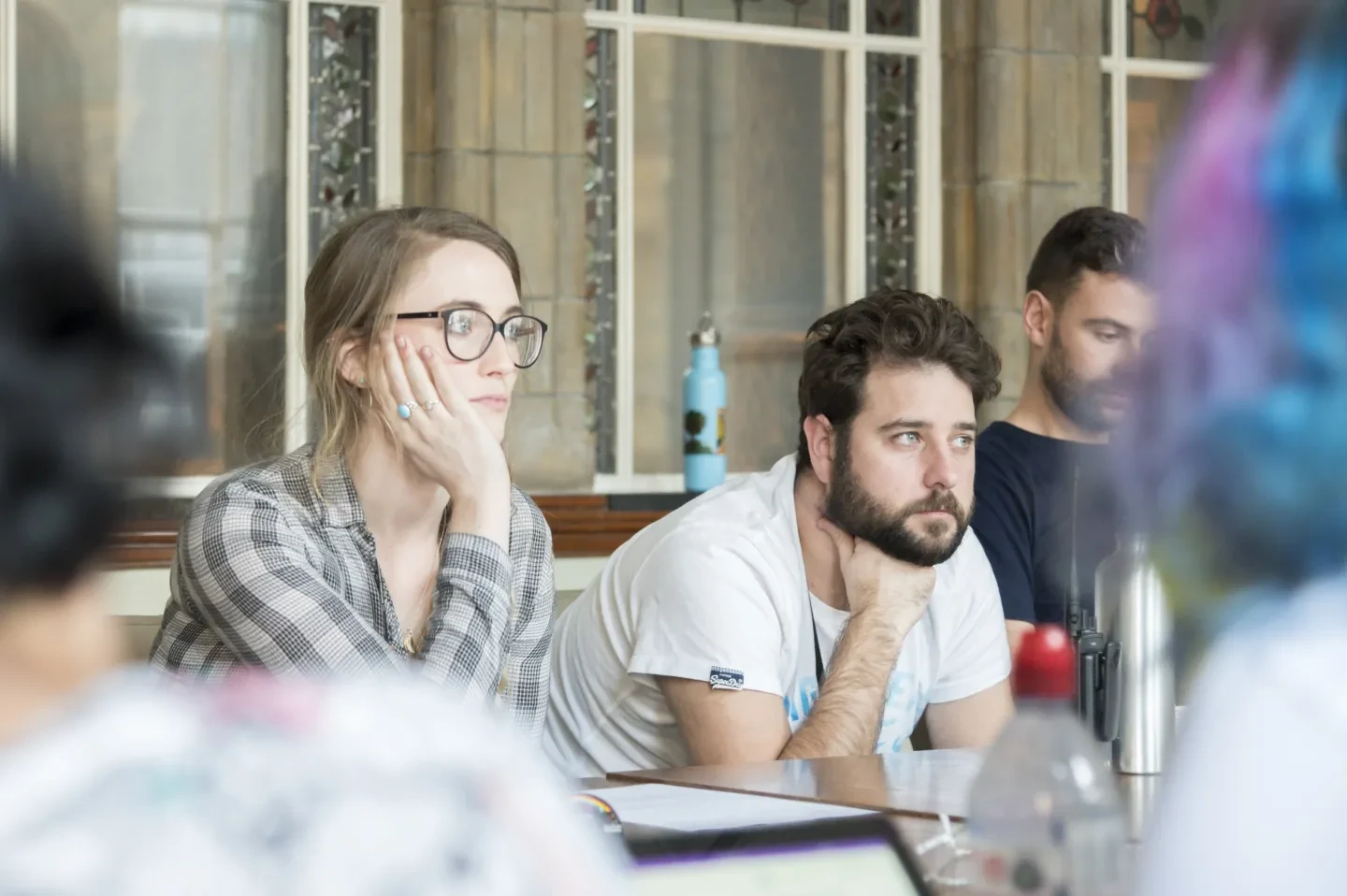 Two people looking attentive.