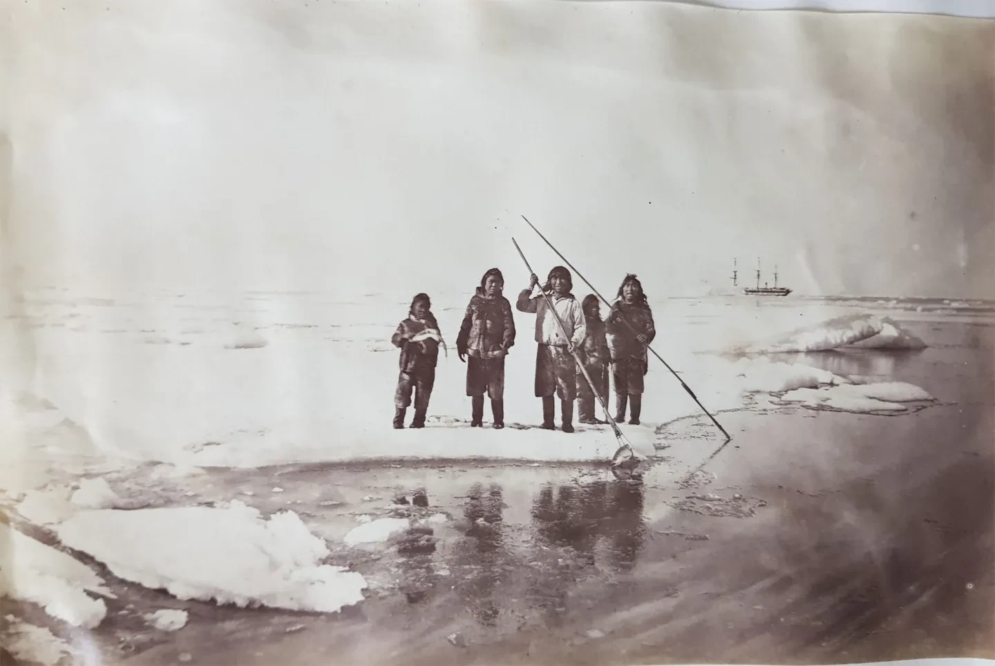Inuit spearfishing for salmon.
